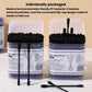 Two boxes of disposable cotton swabs with black spiral tips and loose swab