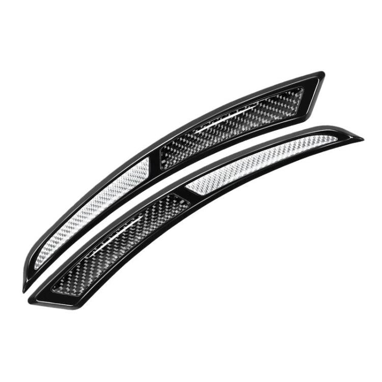 Two-piece wheel arch anti-scratch strip stickers with silver carbon-fiber style inserts and black frame