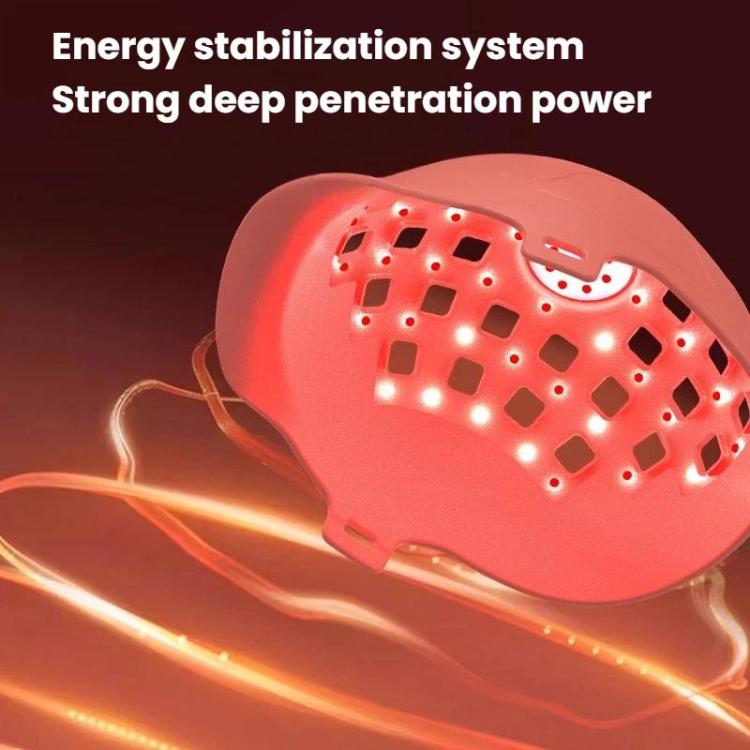 Red laser hair growth cap shown from the side with illuminated LED dot grid