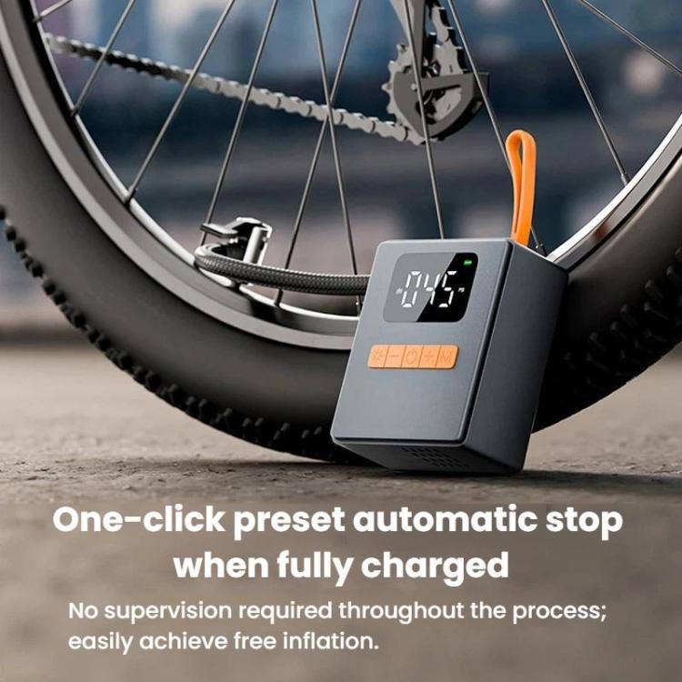 Portable tire inflator connected to bicycle tire using a flexible air hose