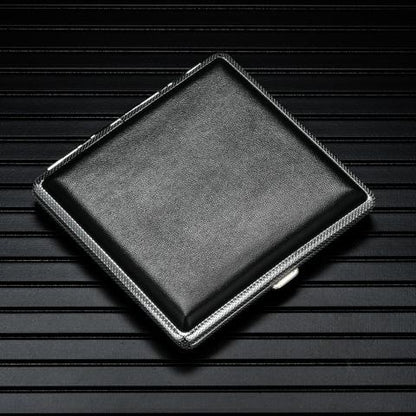 Black leather cigarette case with metal trim, hinged lid closed.