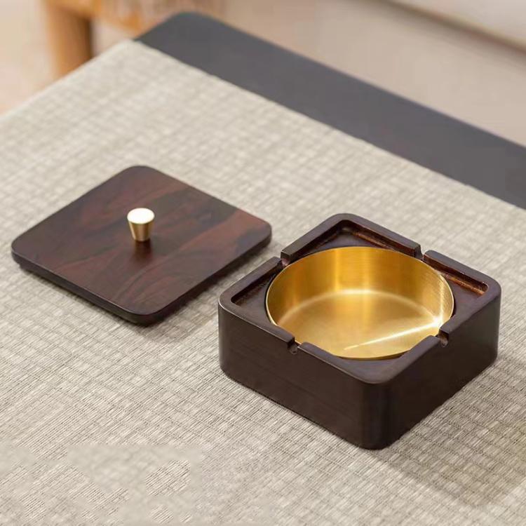 Square wood magnetic ashtray with brass insert and hinged lid, compact tabletop design