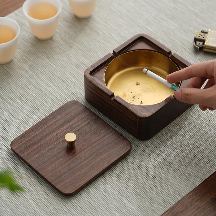 Wood magnetic ashtray with square base, brass bowl, and cigarette ash cleaning brush