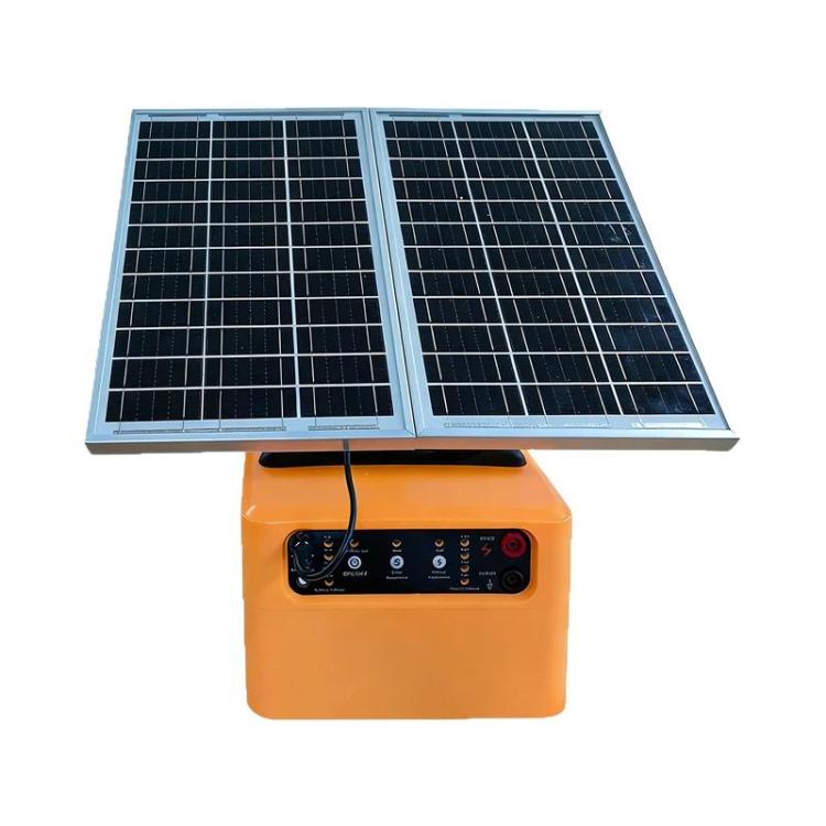 Solar-powered electric fence energizer with orange control unit and twin solar panels