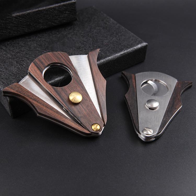 Set of wood cigar scissors with stainless blades and gold button accents