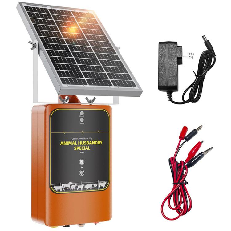 Solar electric fence charger kit: orange unit, solar panel, adapter, and grounding clips