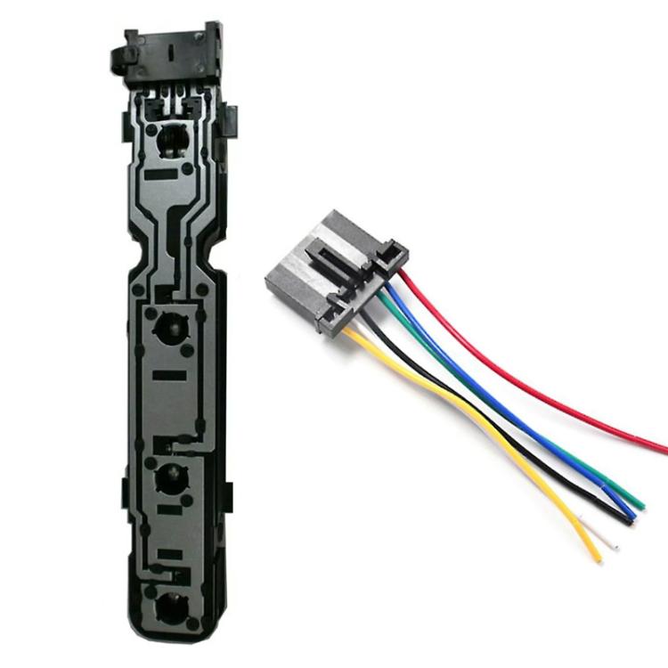 Rear taillight circuit board with connector pins and wiring harness leads