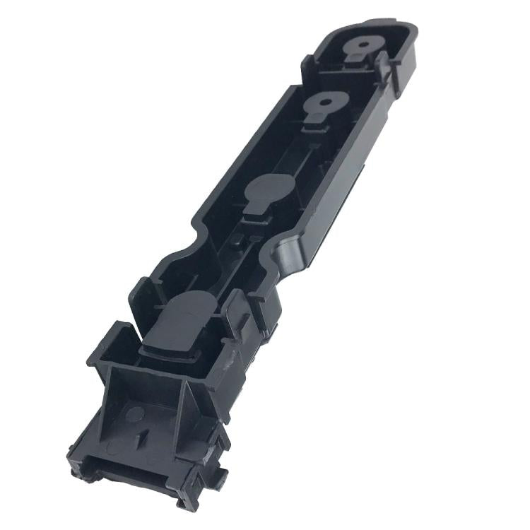 Black taillight connector housing with molded slots and terminals