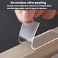 Transparent double-sided adhesive pad with peeled backing, applied to wood