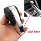 Car shift knob with black handle and silver sides, shown with installation base