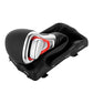 Automatic gear shifter knob with black boot and silver bezel with red insert detail.