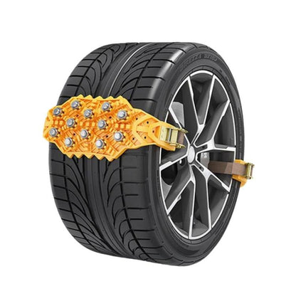 Yellow anti-skid tire track chain on a black wheel, with metal ratchet strap