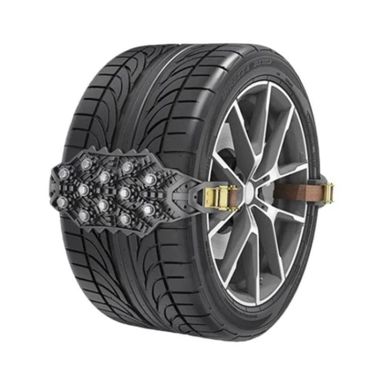 Black and metal tire traction chain on a silver-spoke wheel, side view
