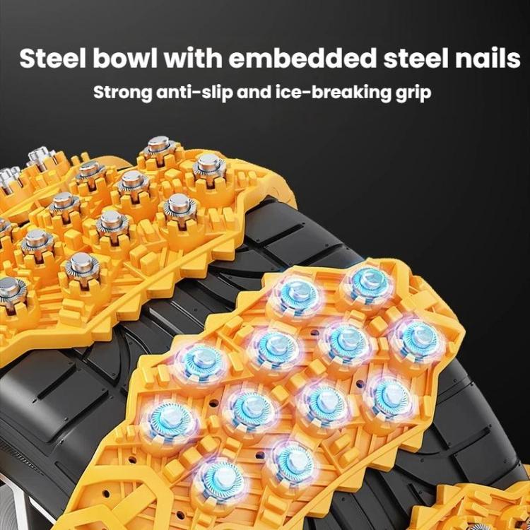 Close-up of yellow traction chain with embedded metal stud bowls and nails