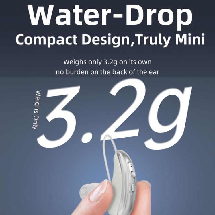 Small behind-the-ear hearing aid held by hand with compact charging case