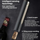 Electric bottle opener releasing a cork, black body with gold-toned spiral