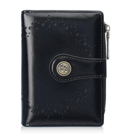 Women’s short wallet in black oil-waxed leather with perforated pattern and zipper