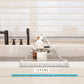 Silver stainless steel bathtub caddy stand with telescoping base for compact placement