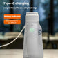 Rechargeable bidet sprayer with green indicator light near button, white