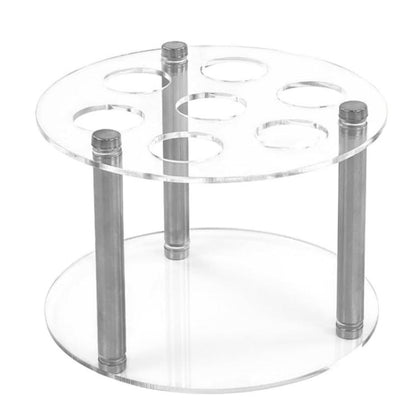 Clear acrylic spice jar holder with seven circular openings and four metal posts
