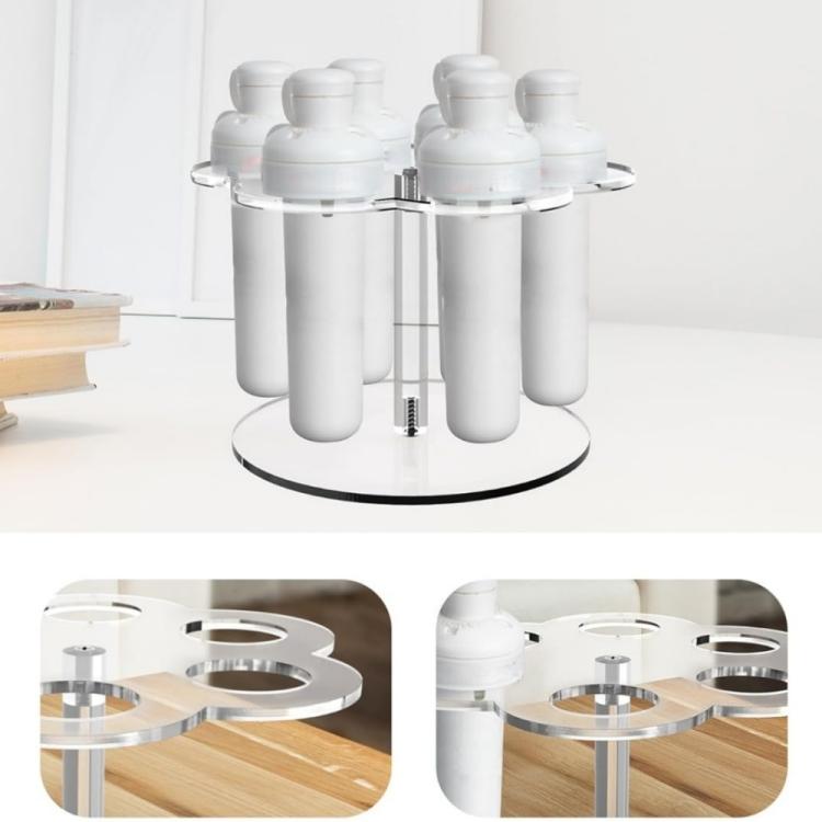 Clear acrylic 6-slot organizer stand holding white cartridges on a round base