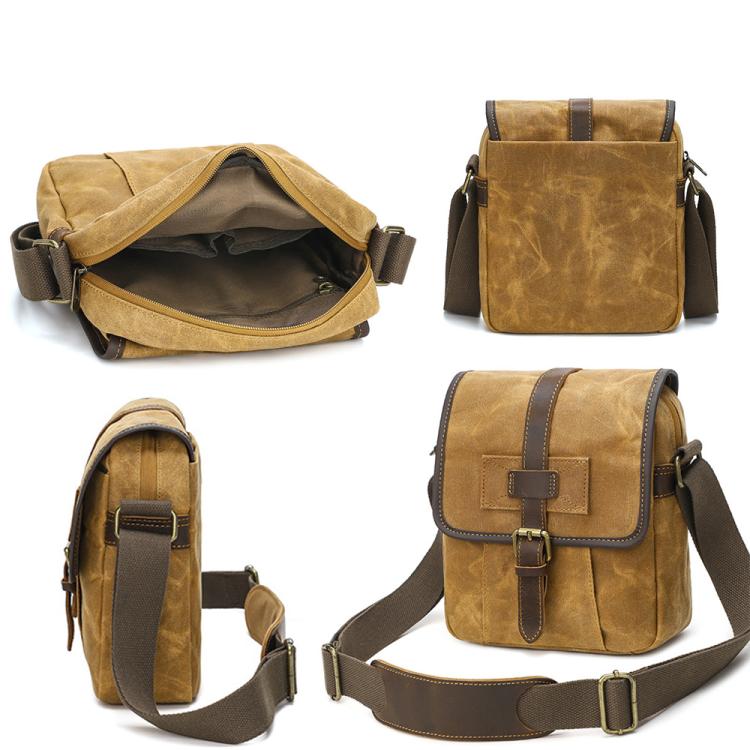 Dusty yellow waxed canvas messenger bag open top showing inner compartment