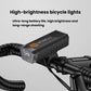 Mounted black bike headlight with clear lens and orange button on handlebar