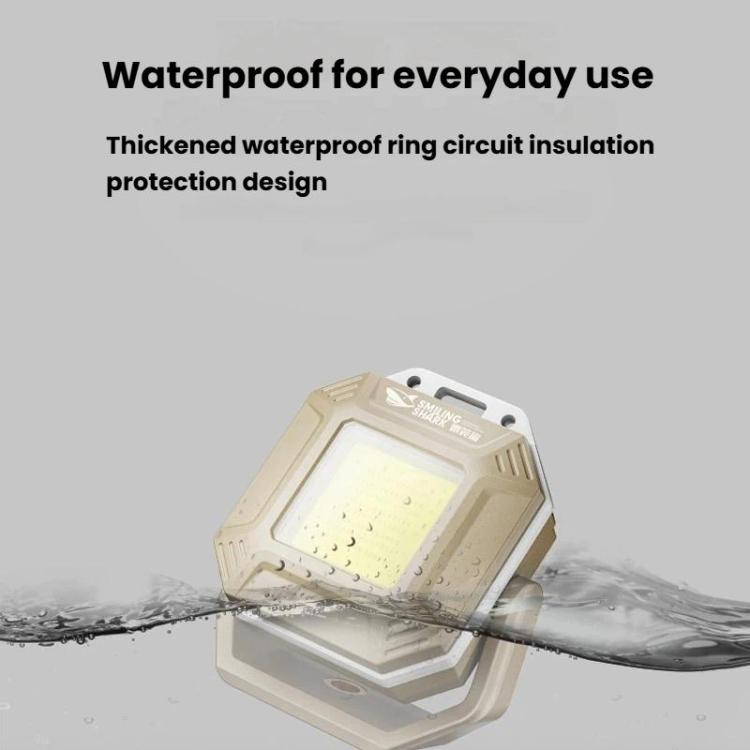 Khaki waterproof mini work light with side handle and glowing LED panel
