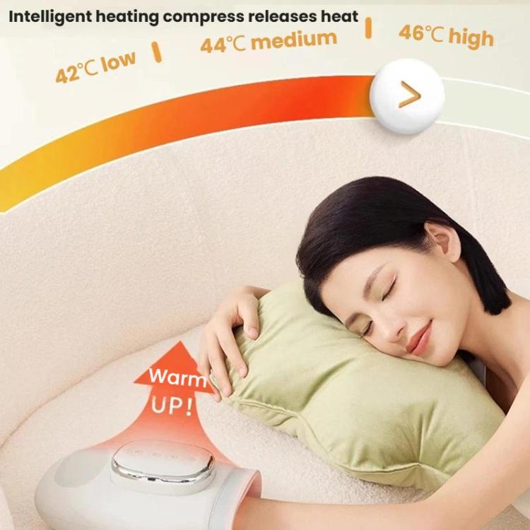 Warm-up heated hand massager on a bed with temperature indicator light