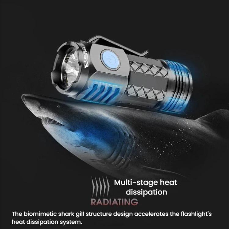 Portable LED mini flashlight shining a blue beam, compact black and silver housing