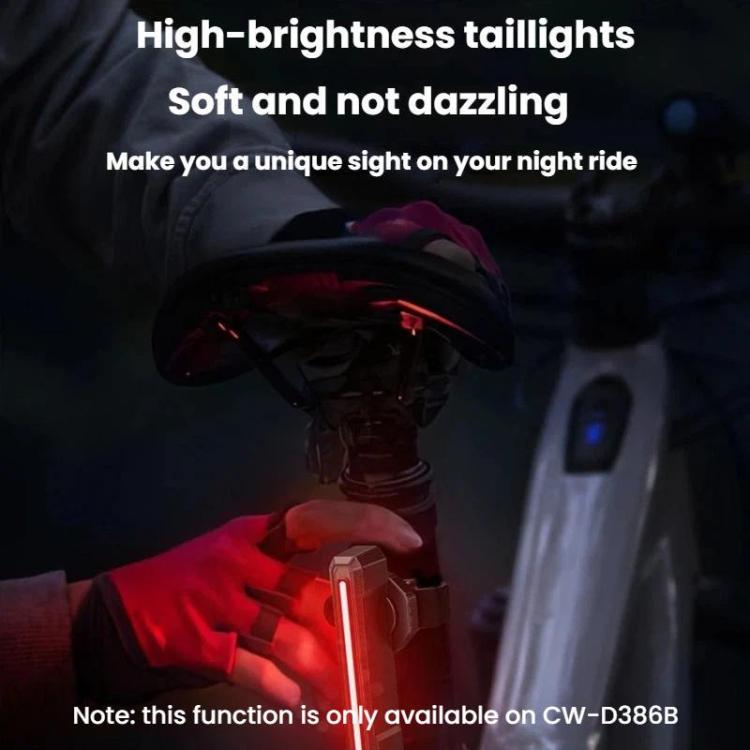 Bike taillight showing a bright red vertical light bar in the rider’s hand