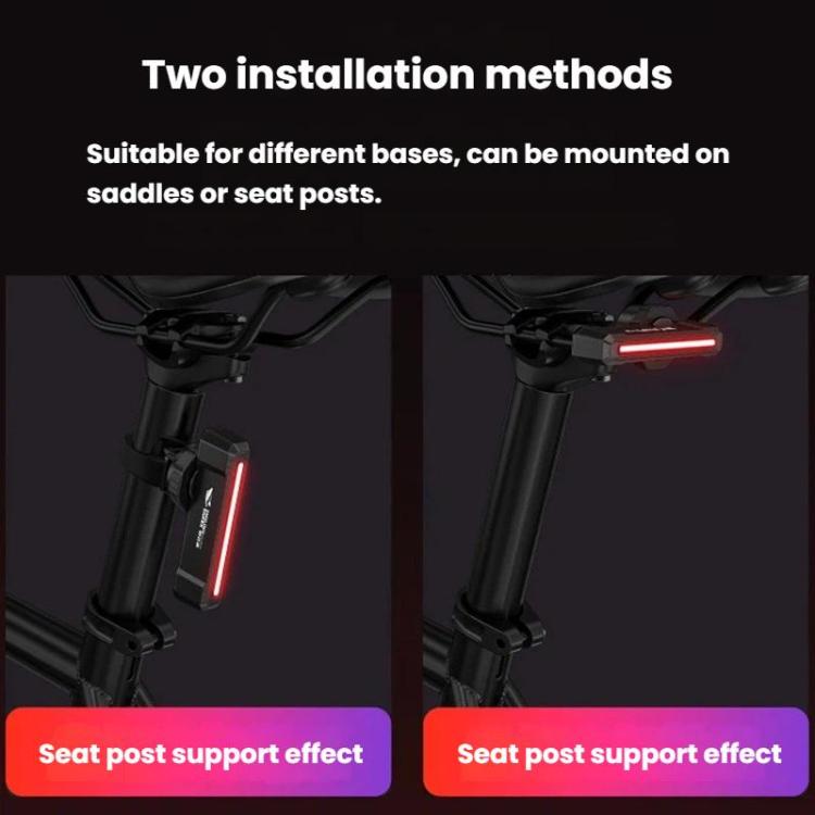 Bike taillight mounted on seatpost support with glowing red vertical beam