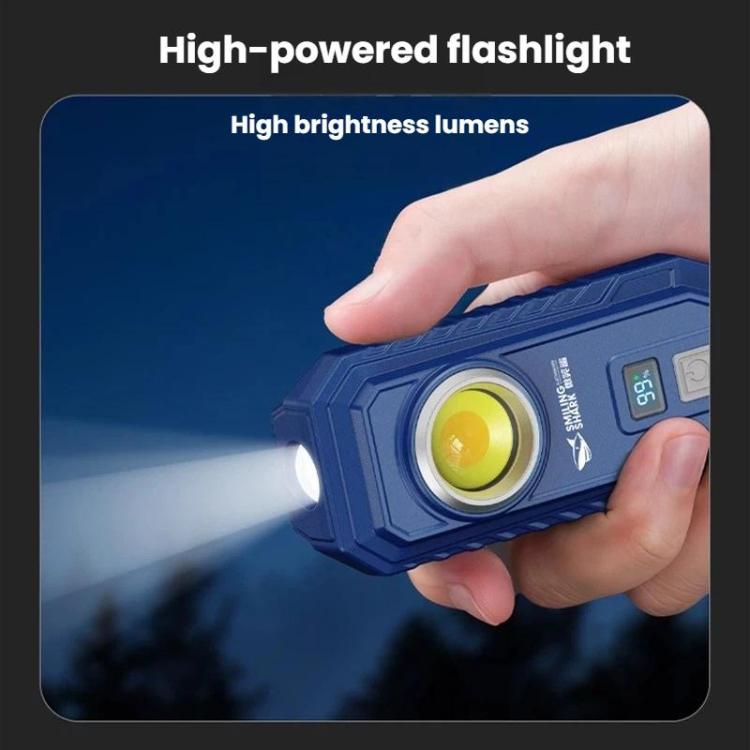 Blue high-brightness LED flashlight held in hand with digital display