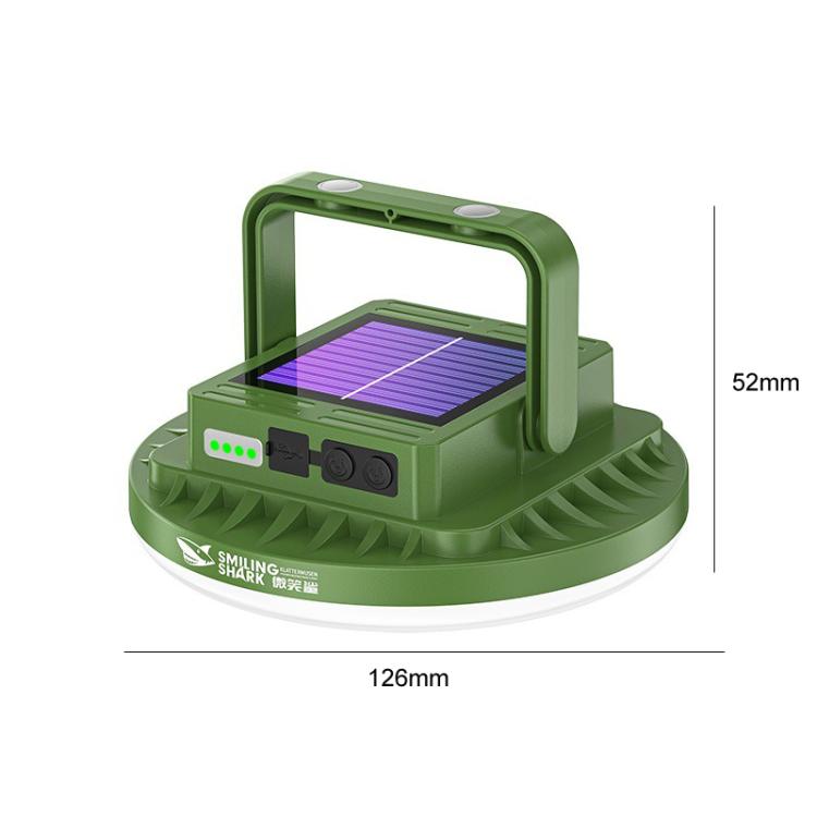 Green solar camping light with shark-style handle and folding frame, small portable lamp