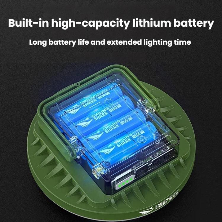 Solar camping light showing built-in lithium battery through clear window panel