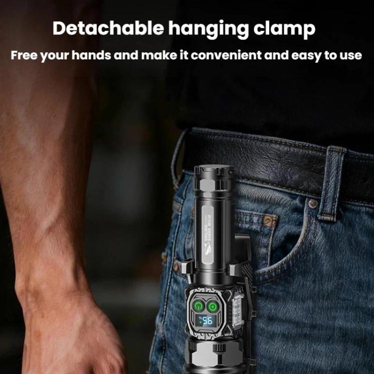 Black flashlight with hanging clamp attached to a blue denim pocket, screen visible