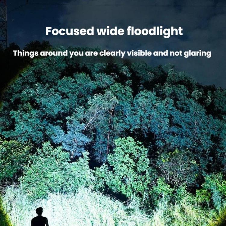 Black floodlight flashlight head emitting a broad beam, with wide coverage lens