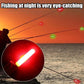 Fishing rod tip light set with red and green flashing LEDs on fishing lines.