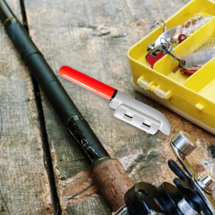 Fishing rod tip light with red round LED and white clip on fishing rod.