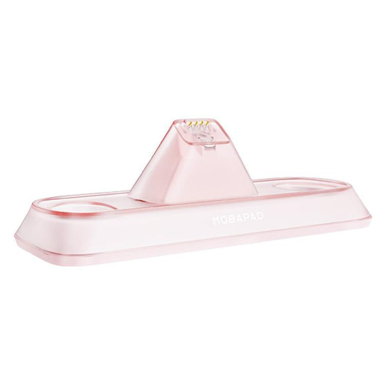Pink controller charging dock with central stand and clear charging slot