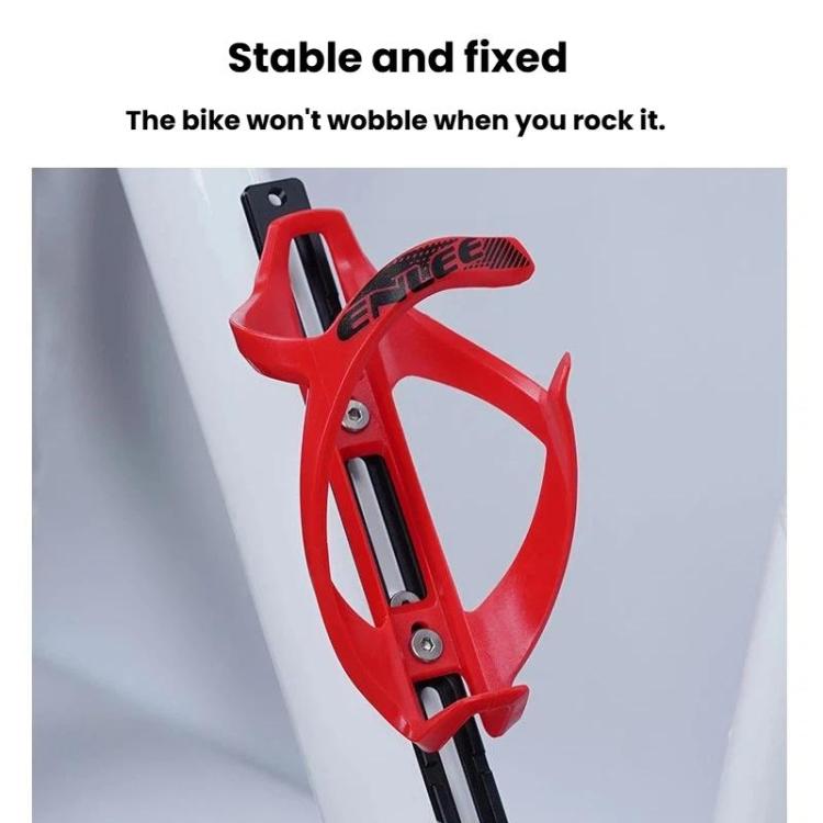 Red bike bottle cage with black adjustable hole insert