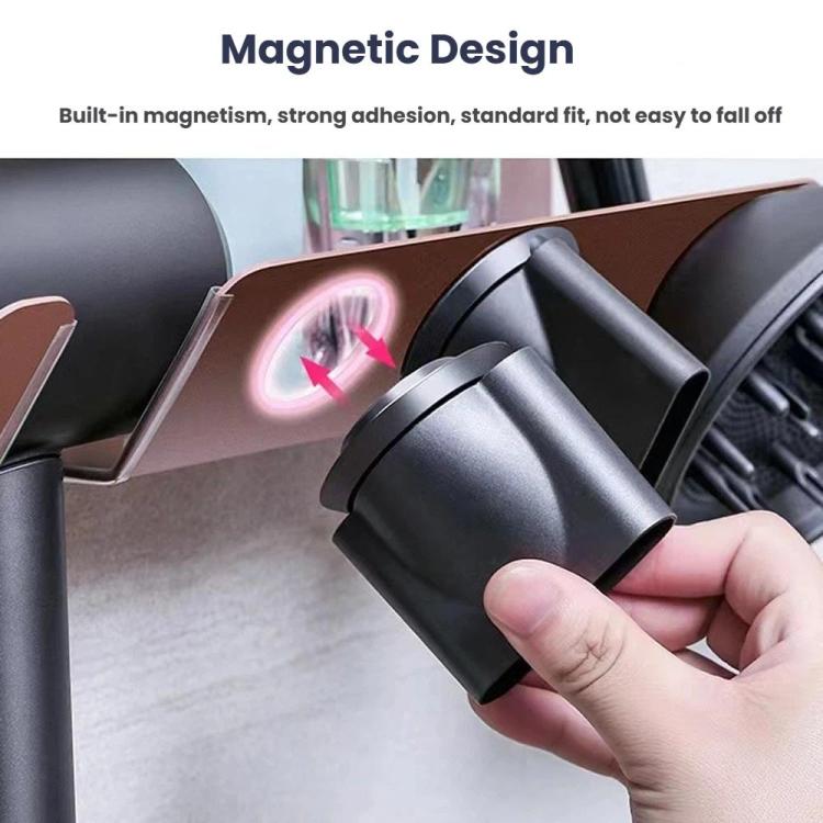Magnetic-style wall mount hair dryer holder with two cradles and hand placing a nozzle.