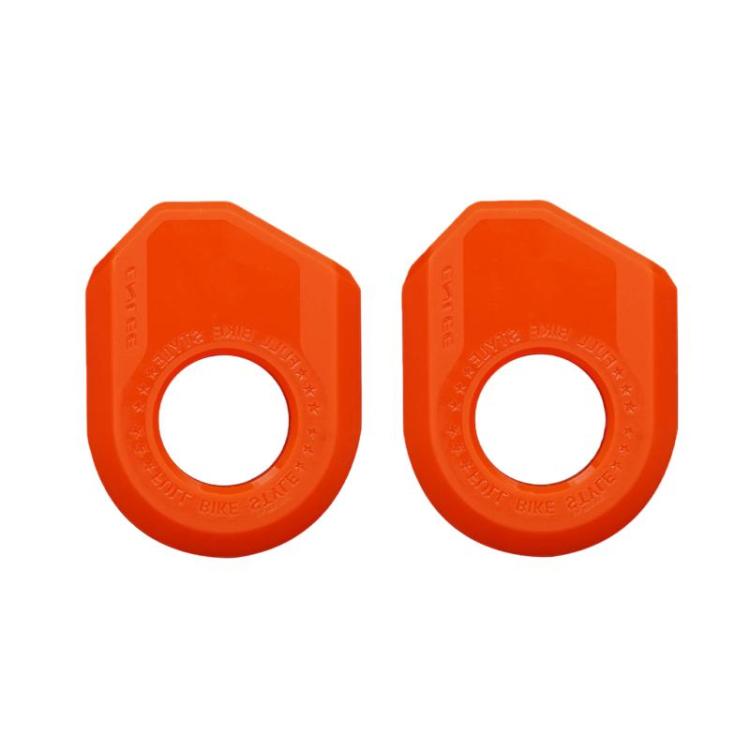 Set of orange bike crank protector sleeves with circular opening, embossed ring detail, 2-pack