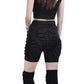 Black protective hip shorts with molded padding for roller skating and skiing