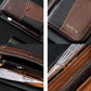 Two-tone RFID wallet with zipper and multi-card slots; shows cards inside and snap strap pull.