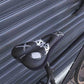 Black bike saddle cover with white graphics installed on a bicycle saddle