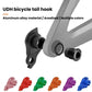 Black aluminum rear derailleur hanger with mounting bolt and washer rings