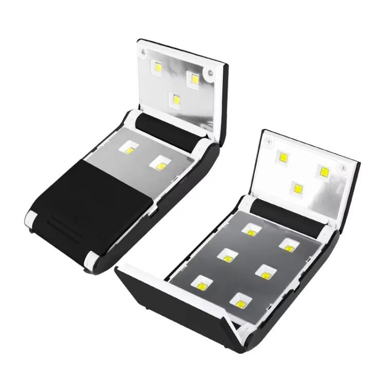 Open folding LED nail curing lamp with visible LED panel lights in compact case