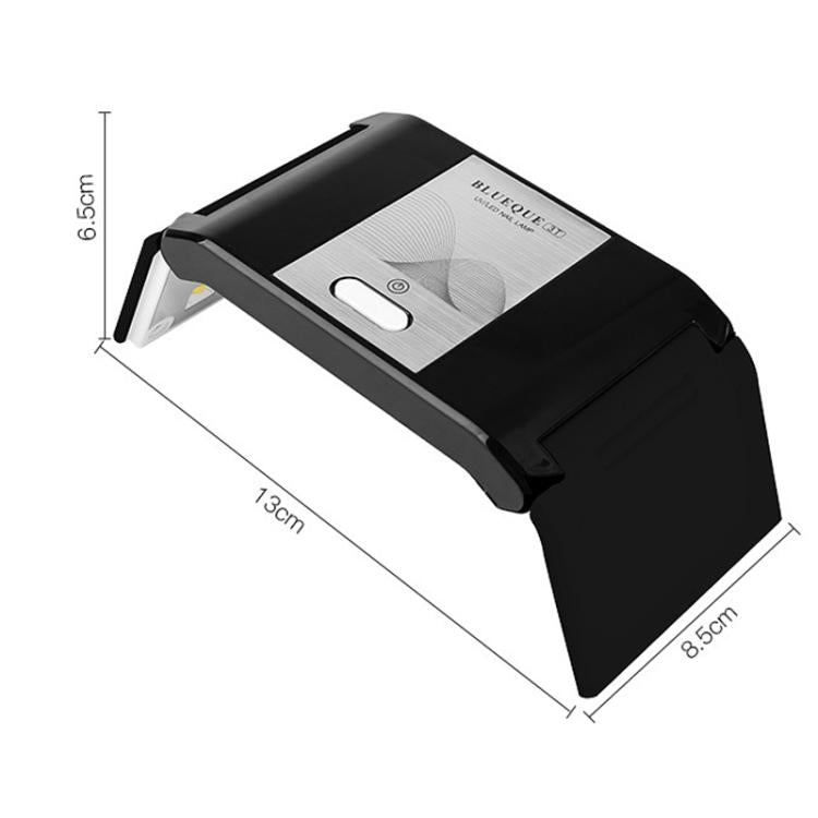 Black folding LED nail curing lamp with compact dimensions and front power button