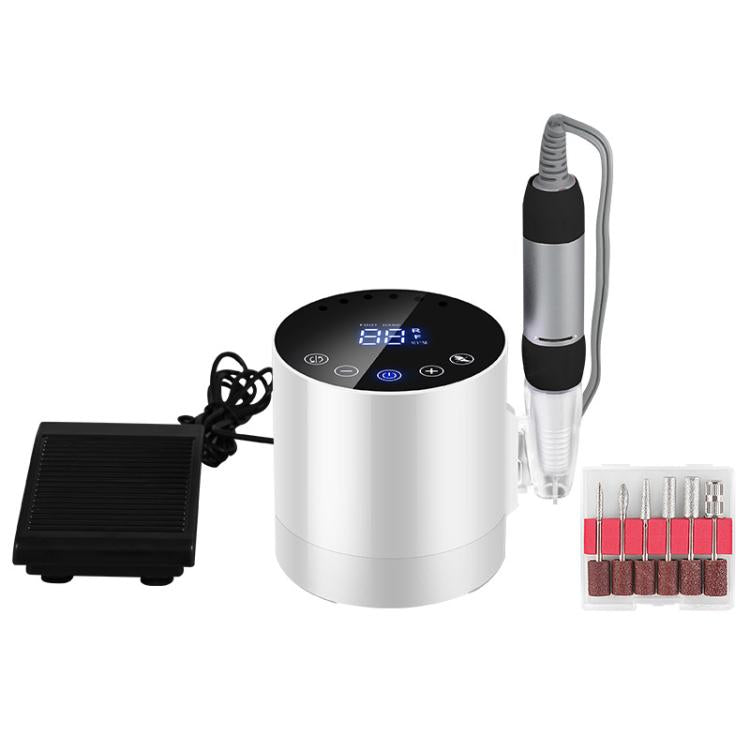 Electric nail buffer tool set with white base, handpiece, and sanding tips on display